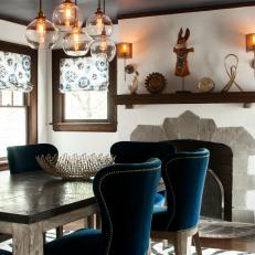 Eclectic Dining Room With Velvet Chairs