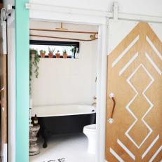 Bathroom Nook With Claw Foot Tub and Tile Message