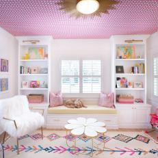 Delightful Pink-and-White Child's Bedroom With Gold Accents