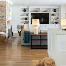 Effortless Entertainment With Wall of White Built-Ins