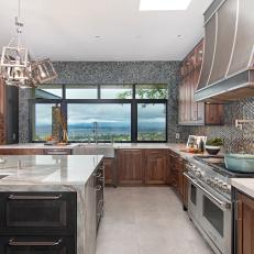 Gray Open Plan Kitchen With Mirrored Tiles