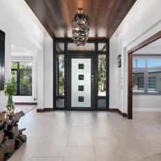 Modern Foyer With Wood Ceiling