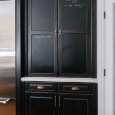 Black Kitchen Cabinet With Blackboard