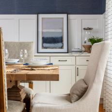 Blue Coastal Dining Room With Linen Chair