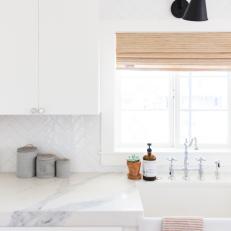 White Kitchen With Black Sconce