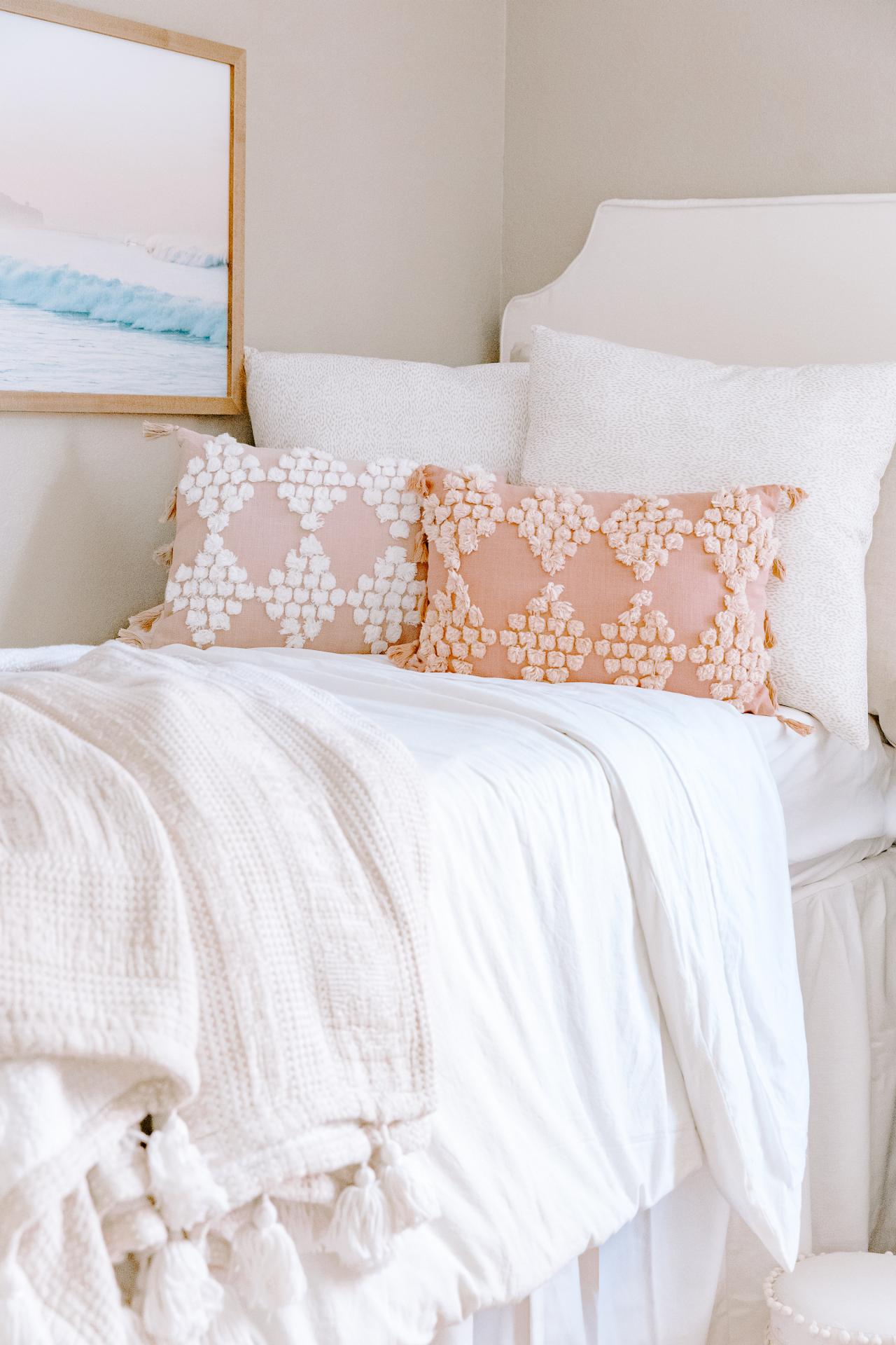 https://hgtvhome.sndimg.com/content/dam/images/hgtv/fullset/2020/8/18/1/Original_Jenny-Reimold-boho-chic-dorm-room-faux-headboard.jpg.rend.hgtvcom.1280.1920.suffix/1597782867391.jpeg