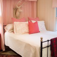 Red and White Country Bedroom With Deer Head