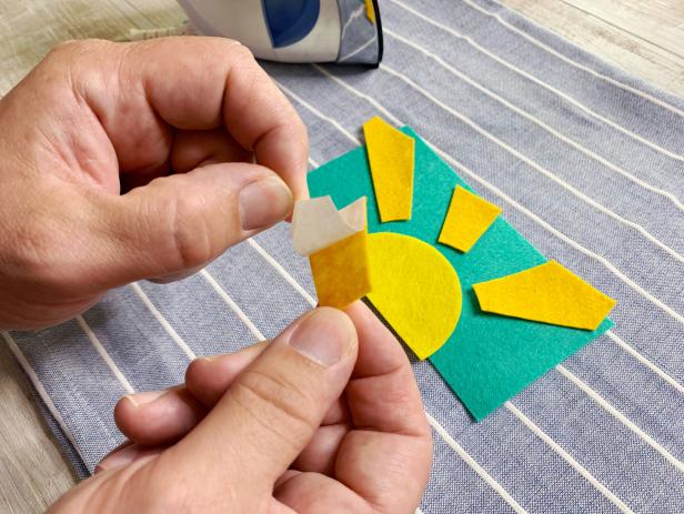 Peel off the adhesive backing of each piece. Then recreate and assemble the patch you designed. Iron together by carefully pressing the iron on to the patch, lift and repeat. Do not slide or your design will shift. Tip: Irim and adjust design as needed.