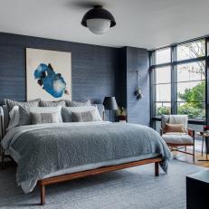 Blue Contemporary Bedroom With Black Door