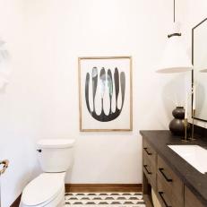 Neutral Contemporary Powder Room With Graphic Art
