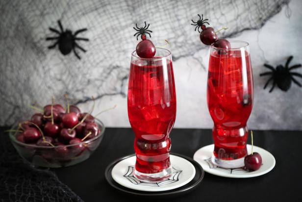 Stir up a drink fit for a femme fatale by adding black cherries to a classic Stinger cocktail. Garnish with a black widow spider pick and dark fresh cherries for a ghoulish touch. 