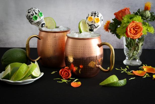 Add a south-of-the-border flourish to the classic mule with spicy flavor and a new spirit - tequila!  Garnish with a lime wheel and a festive sugar skull pick before serving.