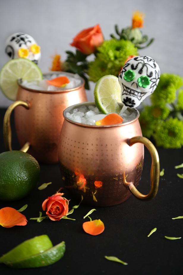 Add a south-of-the-border flourish to the classic mule with spicy flavor and a new spirit - tequila!  Garnish with a lime wheel and a festive sugar skull pick before serving.
