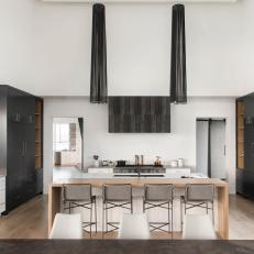 Contemporary Chef Kitchen With Black Lighting