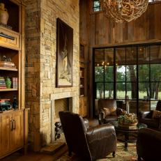 Brown Rustic Living Room With Antler Pendant