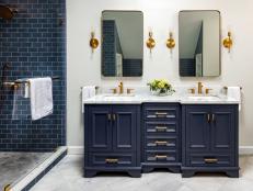 Blue Double Vanity Bathroom With Gold Fixtures