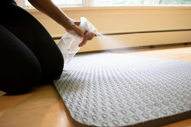 Spray and wipe down your yoga mat to disinfect it after class.