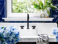 Farmhouse Sink With Black Faucet in Front of Window