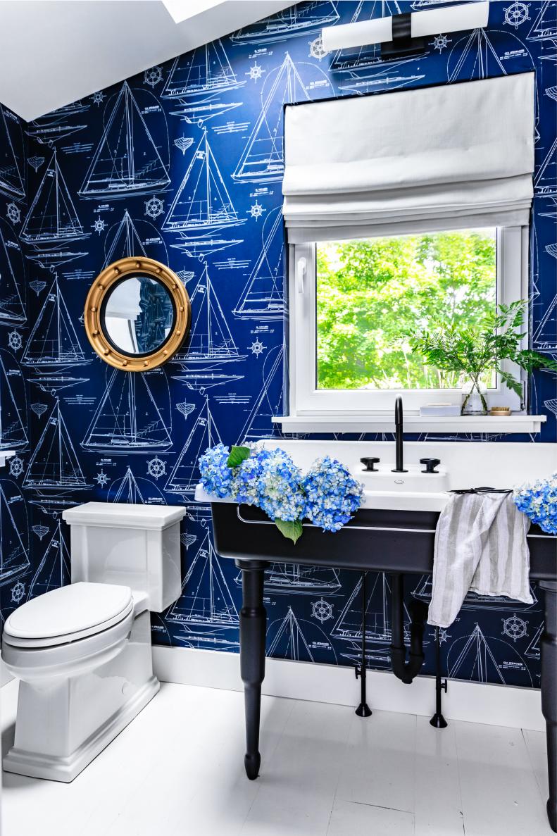 Wide Vanity With Farmhouse Sink in Blue Nautical-Themed Bathroom