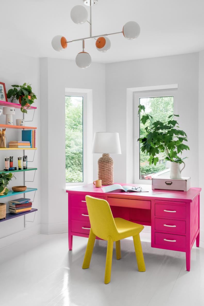 White Contemporary Studio Has Colorful Desk and Chair