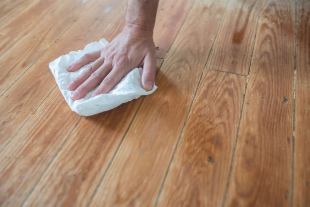 Run a rag or mop over the floor to evenly distribute the solution.