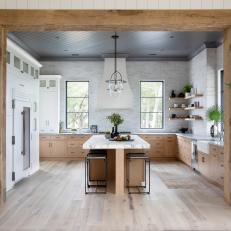 Kitchen With Reclaimed Wood Beam Entrance