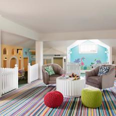 Multicolored Attic Playroom With Striped Carpet