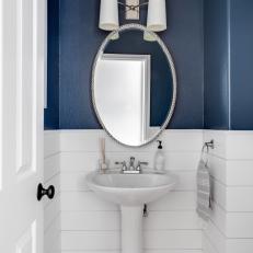 Blue and White Contemporary Powder Room With Shiplap 