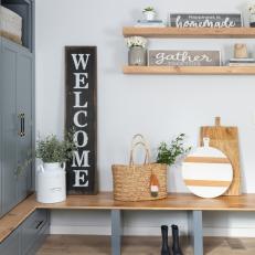 Cottage Mudroom With Welcome Sign