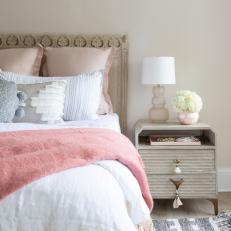 Neutral Bohemian Bedroom With Pink Throw