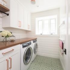 White Laundry Room With Green Tile Floor