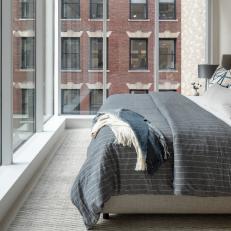 Urban Neutral Bedroom With City View