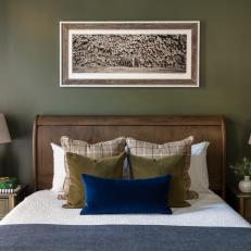 Green Guest Bedroom With Blue Velvet Pillow