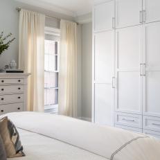 White Transitional Bedroom With Cabinetry