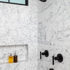 Gray Marble Shower With Black Fixtures