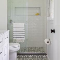 White Bathroom With Striped Towel