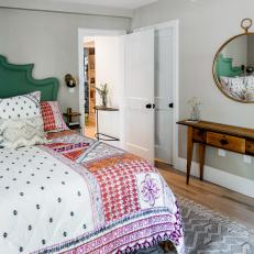 Eclectic Bedroom With Green Headboard