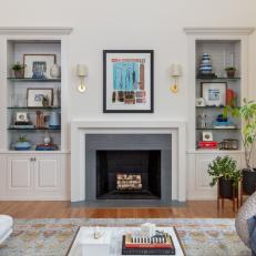 Transitional Living Room With Gray Fireplace