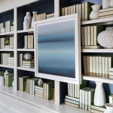 Bookshelf With Blue Art