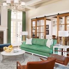 Neutral Contemporary Living Room With Green Sofa