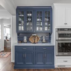 Blue Built-In Shelf in White Kitchen