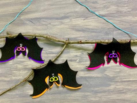 Make Budget-Friendly Bat Halloween Decor With Felt and a Branch From Your Yard