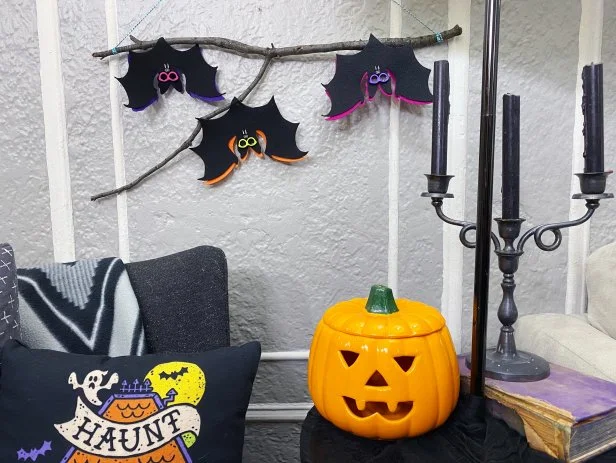 Felt Bat Decoration Hanging Above Halloween Decor