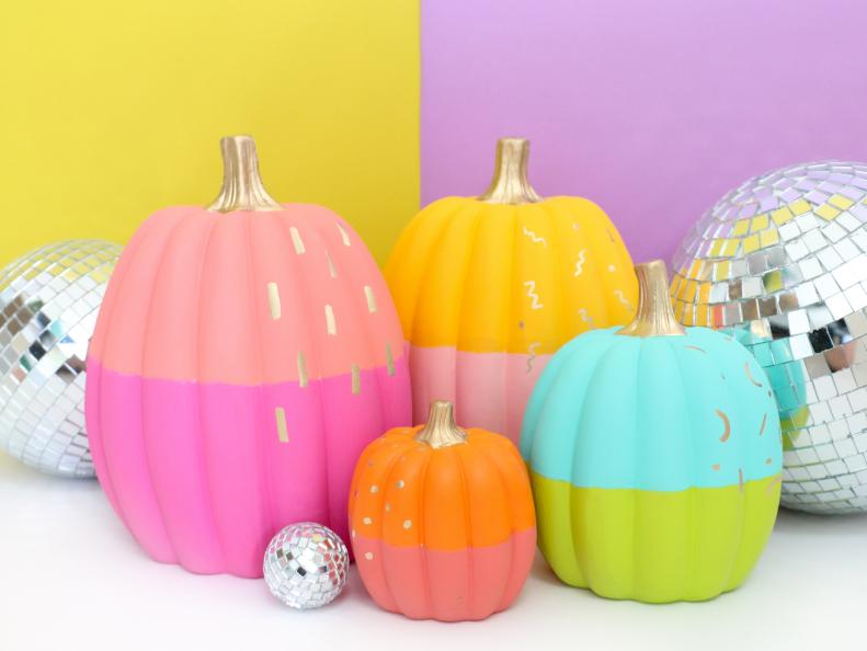 Disco balls and painted pumpkins? Kailo Chic's Kara Whitten created the perfect bright and shiny Halloween pairing. 