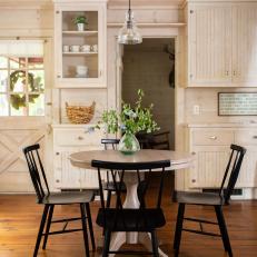 Country Dining Area With Black Chairs