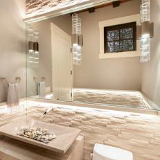 White Powder Room With Stone Walls