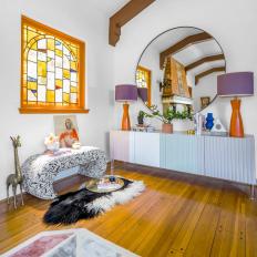 Eclectic Living Room With Orange Window