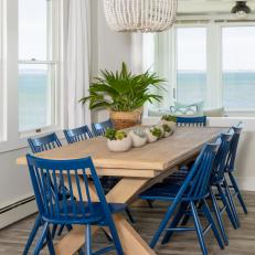 Coastal Dining Room With Blue Chairs