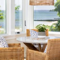Coastal Dining Area With Wicker Chairs