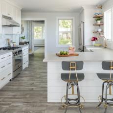 White Coastal Open Plan Kitchen With Gray Stools
